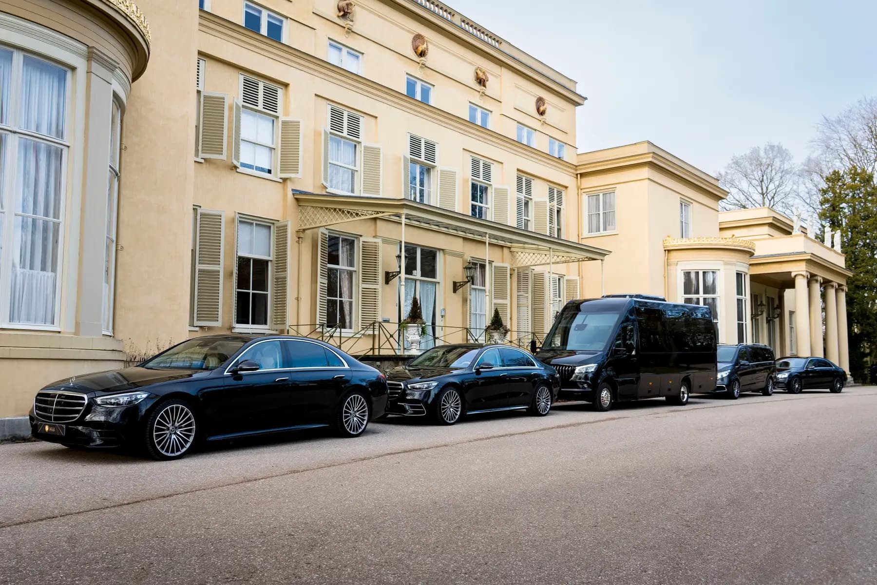 Wedding guests boarding a coach